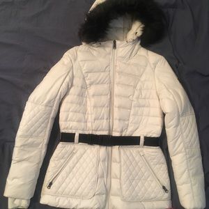 Cream color north face puffy jacket with faux fur